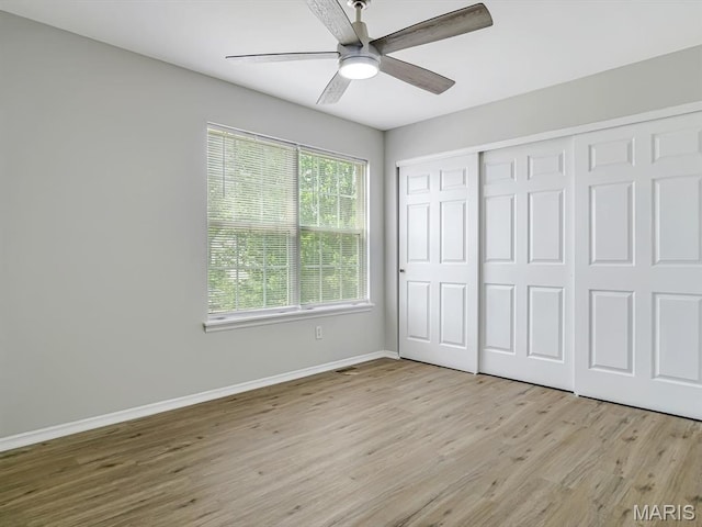240 Brookmont Dr, Belleville, IL 62221 - unfurnished bedroom with light wood-style flooring, a closet, and ceiling fan