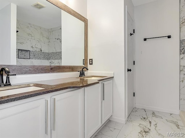 240 Brookmont Dr, Belleville, IL 62221 - full bathroom with marble finish floors, double vanity, and a shower