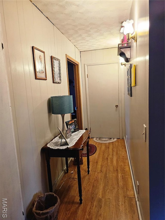 521 Cherry St, Tilden, IL 62292 - hall with wood finished floors and a textured ceiling