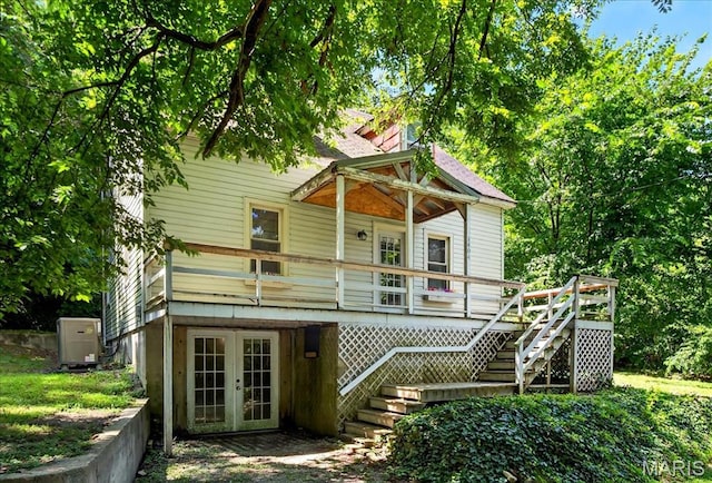 1404 State Route 156, Waterloo, IL 62298 - back of property with french doors, stairs, and a deck