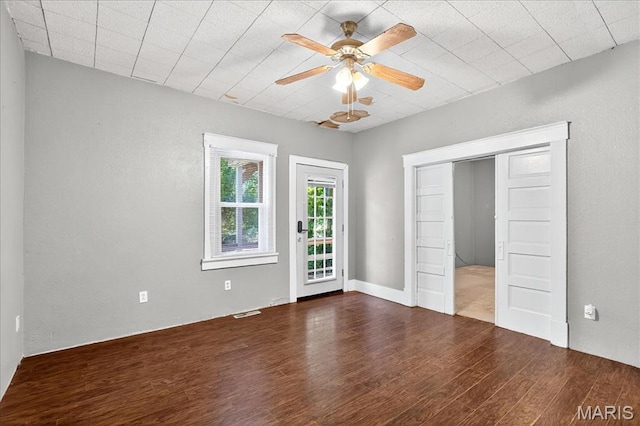 1404 State Route 156, Waterloo, IL 62298 - unfurnished bedroom featuring wood finished floors, access to outside, and a ceiling fan