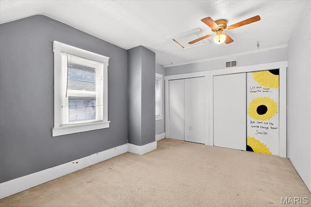 1404 State Route 156, Waterloo, IL 62298 - unfurnished bedroom featuring carpet floors, two closets, attic access, and ceiling fan