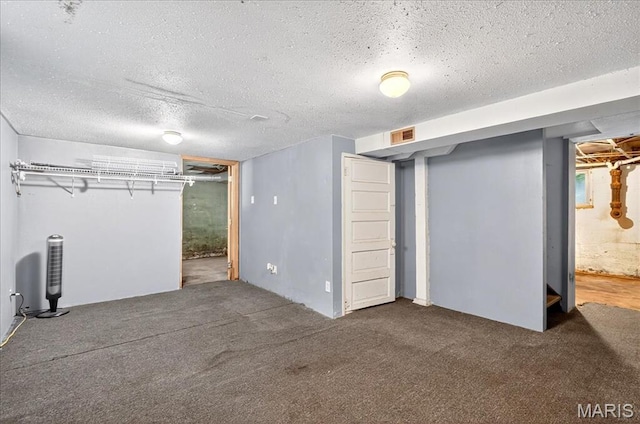 1404 State Route 156, Waterloo, IL 62298 - finished below grade area with a textured ceiling and carpet floors