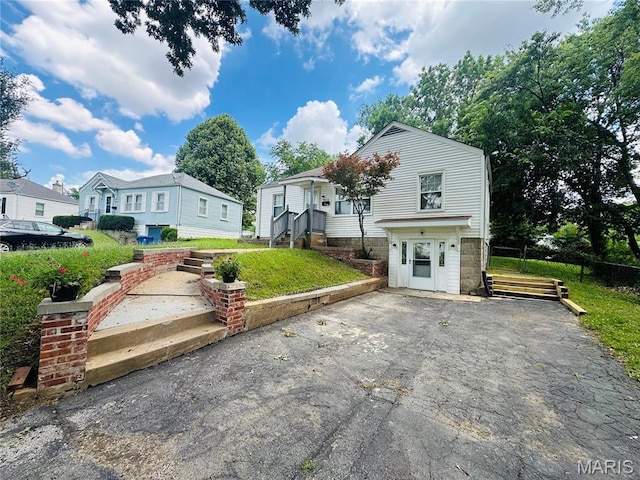 3418 Eastridge Ln, Saint Louis, MO 63074 - view of front of property with asphalt driveway