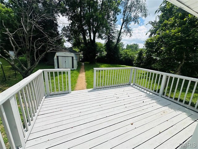 3418 Eastridge Ln, Saint Louis, MO 63074 - wooden deck with a shed and a lawn