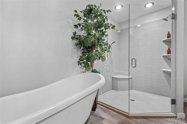 34 Windermere Dr, Glen Carbon, IL 62034 - bathroom with a freestanding tub, a stall shower, and recessed lighting