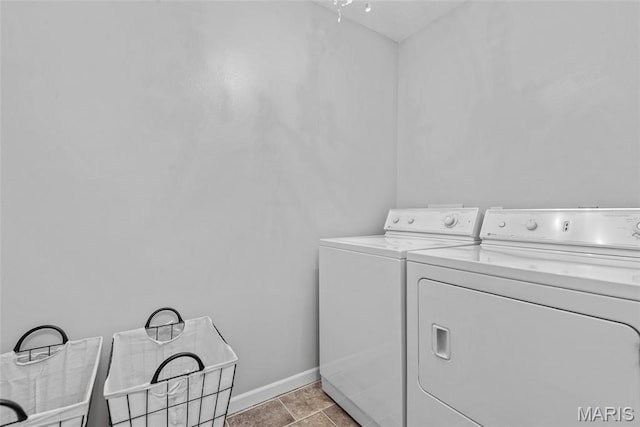 34 Windermere Dr, Glen Carbon, IL 62034 - laundry room featuring washer and dryer and baseboards