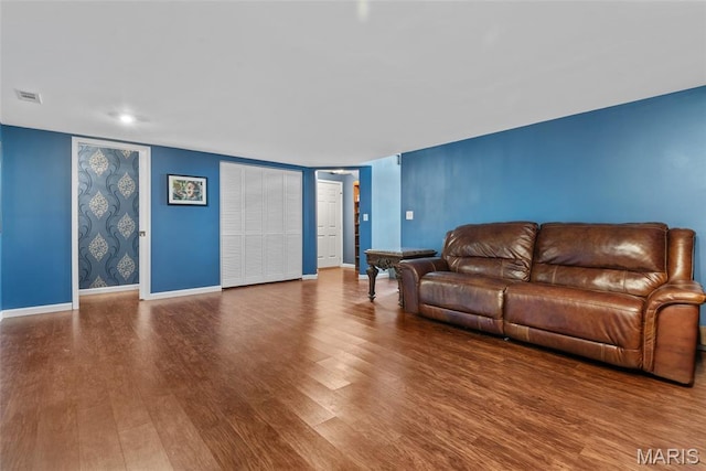 34 Windermere Dr, Glen Carbon, IL 62034 - living room featuring wood finished floors and baseboards