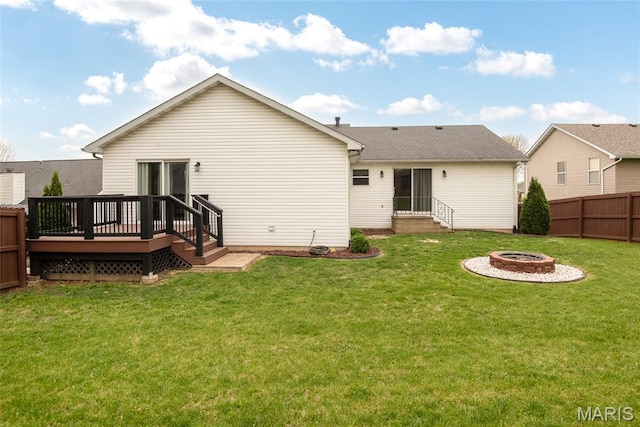 34 Windermere Dr, Glen Carbon, IL 62034 - rear view of property featuring an outdoor fire pit, a wooden deck, and a fenced backyard