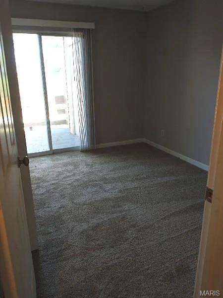 1446 Bluebird Ter, Saint Louis, MO 63144 - unfurnished room with baseboards and carpet