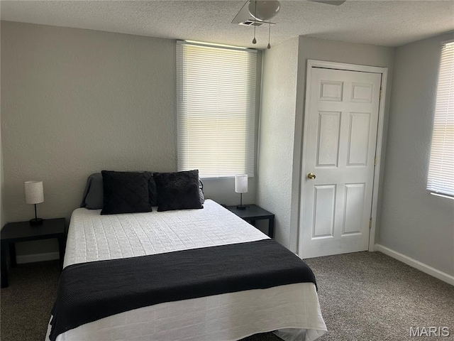 239 N Center St, Sullivan, MO 63080 - carpeted bedroom with baseboards and a textured ceiling