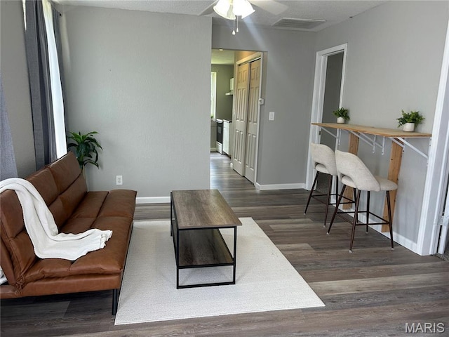 239 N Center St, Sullivan, MO 63080 - living area with ceiling fan and wood finished floors