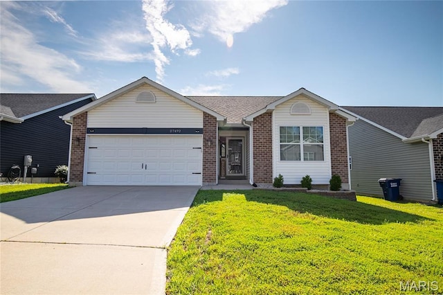 27492 Forest Ridge Ct, Warrenton, MO 63383 - single story home with brick siding, a garage, driveway, and a front yard