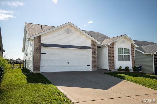27492 Forest Ridge Ct, Warrenton, MO 63383 - ranch-style home with a garage, concrete driveway, brick siding, and a shingled roof