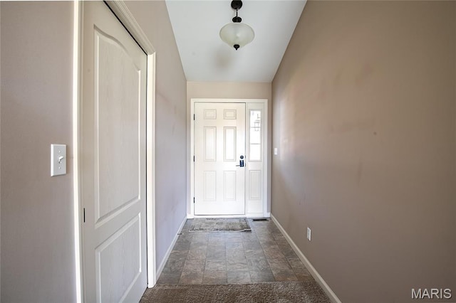 27492 Forest Ridge Ct, Warrenton, MO 63383 - doorway with baseboards and stone finish floors