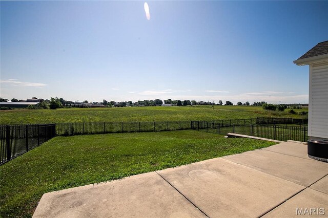 27492 Forest Ridge Ct, Warrenton, MO 63383 - fenced backyard with a patio and a view of rural / pastoral area
