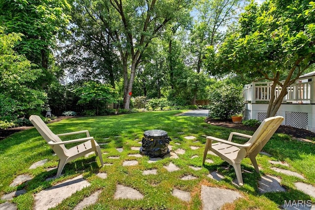 8548 Big Bend Blvd, Webster Groves, MO 63119 - view of grassy yard with a wooden deck