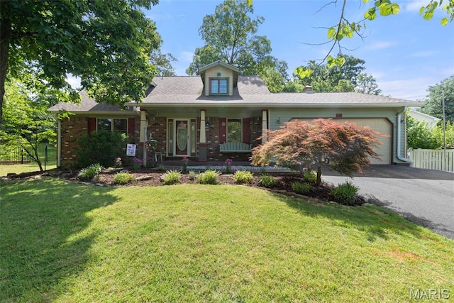 178 Spring Leigh Ct, Ballwin, MO 63011 - view of front of home with a garage, covered porch, asphalt driveway, brick siding, and a chimney