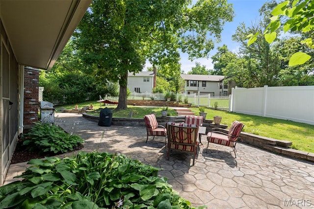 178 Spring Leigh Ct, Ballwin, MO 63011 - fenced backyard with a patio area and a grill