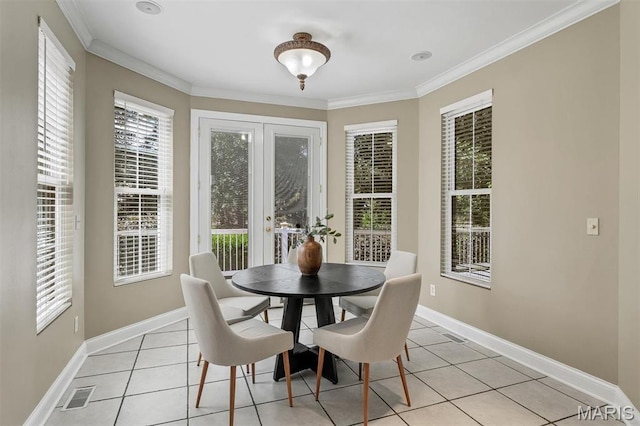 1011 Hawks Landing Dr, Lake St Louis, MO 63367 - dining space featuring light tile patterned floors, ornamental molding, and healthy amount of natural light