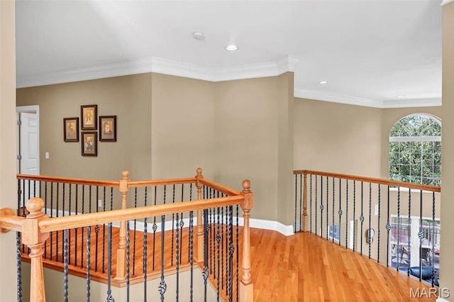 1011 Hawks Landing Dr, Lake St Louis, MO 63367 - hall with wood finished floors, an upstairs landing, crown molding, and recessed lighting