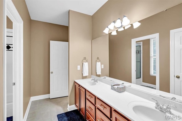 1011 Hawks Landing Dr, Lake St Louis, MO 63367 - bathroom with double vanity and tile patterned flooring