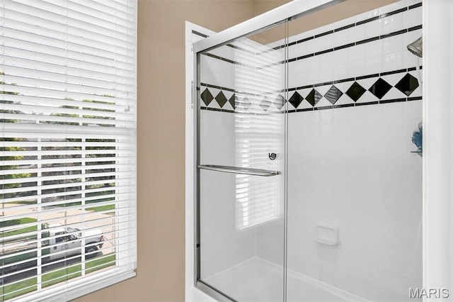1011 Hawks Landing Dr, Lake St Louis, MO 63367 - full bathroom featuring shower / bath combination with glass door
