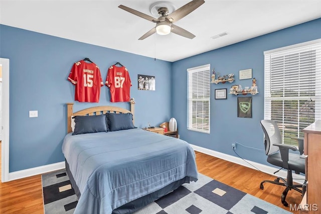 1011 Hawks Landing Dr, Lake St Louis, MO 63367 - bedroom featuring wood finished floors and a ceiling fan