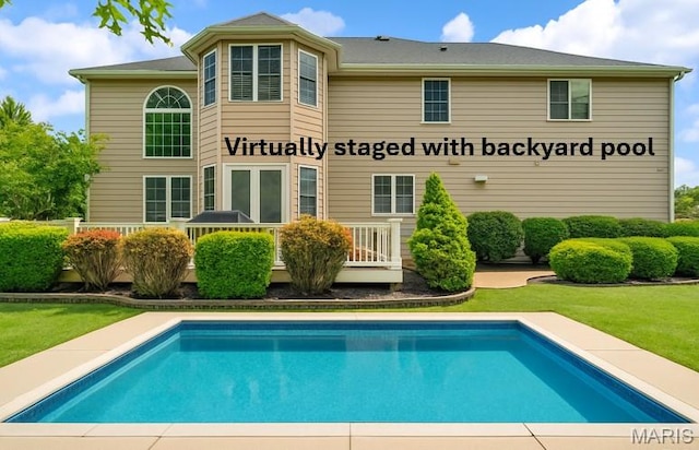 1011 Hawks Landing Dr, Lake St Louis, MO 63367 - rear view of house with an outdoor pool and a yard
