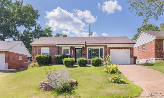 7373 Marwinette Ave, Saint Louis, MO 63116 - view of front of home featuring an attached garage, brick siding, concrete driveway, and a front lawn