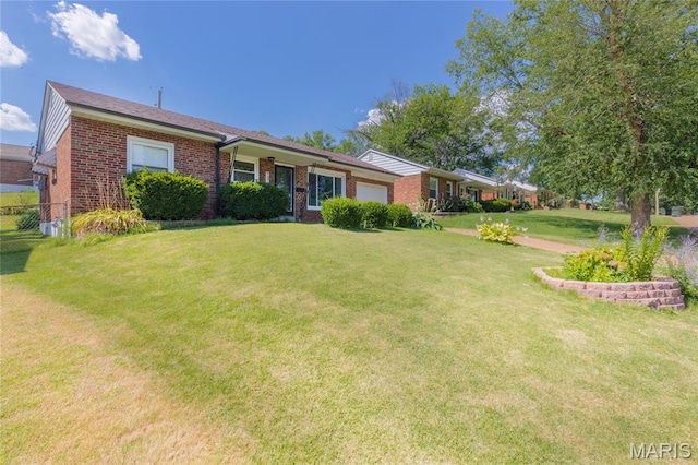 7373 Marwinette Ave, Saint Louis, MO 63116 - ranch-style house featuring brick siding, an attached garage, and a front yard