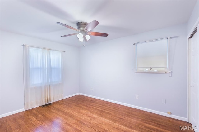 7373 Marwinette Ave, Saint Louis, MO 63116 - empty room featuring ceiling fan and wood finished floors