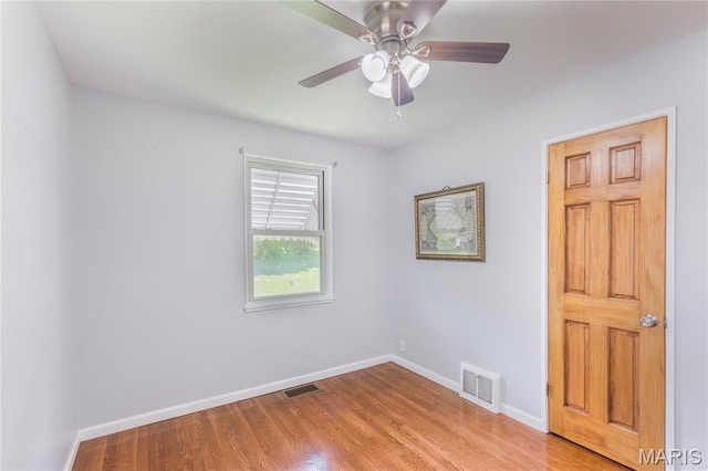 7373 Marwinette Ave, Saint Louis, MO 63116 - unfurnished room featuring a ceiling fan and wood finished floors