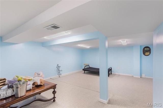 7373 Marwinette Ave, Saint Louis, MO 63116 - finished below grade area featuring carpet flooring and baseboards