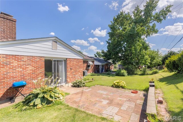 7373 Marwinette Ave, Saint Louis, MO 63116 - view of yard with a patio area