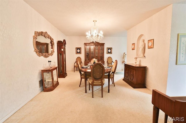 613 N W St, Raymond, IL 62560 - dining area with a chandelier and carpet floors
