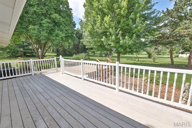 613 N W St, Raymond, IL 62560 - wooden deck with a lawn and view of wooded area