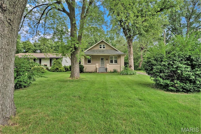 11714 Larimore Rd, Saint Louis, MO 63138 - bungalow-style house with a front yard