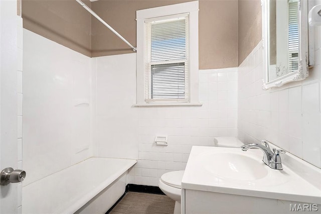 11714 Larimore Rd, Saint Louis, MO 63138 - bathroom featuring tile walls, tub / shower combination, and vanity