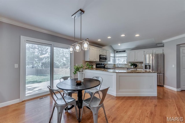 13153 Barrett Meadows Dr, Ballwin, MO 63021 - dining room with ornamental molding, light wood-type flooring, and recessed lighting