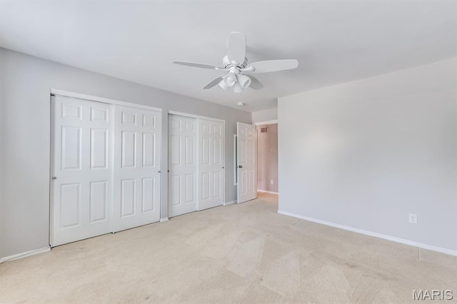13153 Barrett Meadows Dr, Ballwin, MO 63021 - unfurnished bedroom with two closets, carpet, and ceiling fan