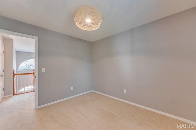 13153 Barrett Meadows Dr, Ballwin, MO 63021 - spare room with light carpet and baseboards