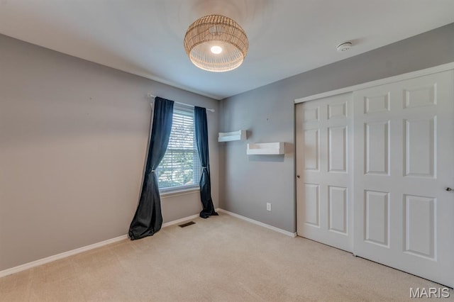 13153 Barrett Meadows Dr, Ballwin, MO 63021 - unfurnished bedroom featuring carpet floors and a closet