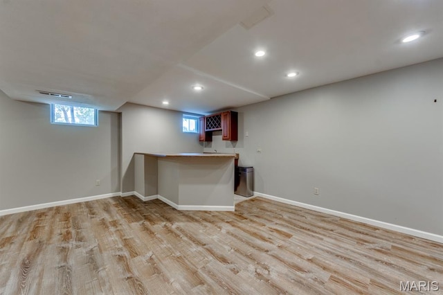 13153 Barrett Meadows Dr, Ballwin, MO 63021 - bar area featuring recessed lighting and light wood-type flooring