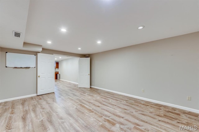 13153 Barrett Meadows Dr, Ballwin, MO 63021 - finished basement with light wood-style floors and recessed lighting