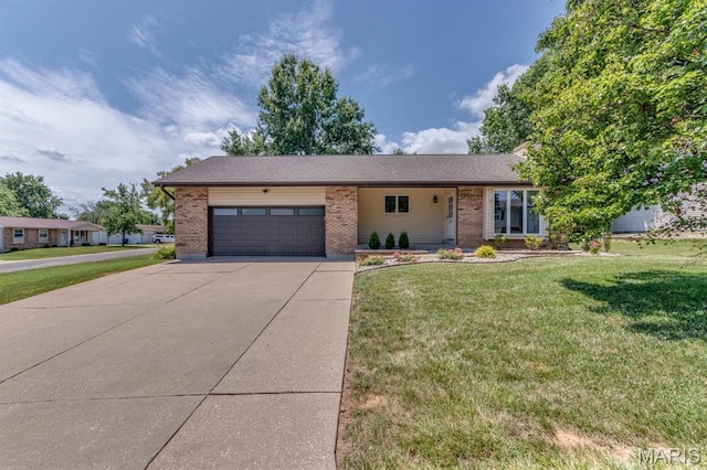 3534 Carriage Run Dr, Saint Charles, MO 63303 - single story home with concrete driveway, a garage, brick siding, and a front lawn