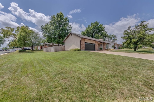3534 Carriage Run Dr, Saint Charles, MO 63303 - view of front of property featuring a garage, concrete driveway, and brick siding