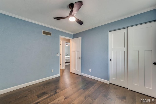 3534 Carriage Run Dr, Saint Charles, MO 63303 - unfurnished bedroom featuring hardwood / wood-style floors, ornamental molding, a closet, and a ceiling fan