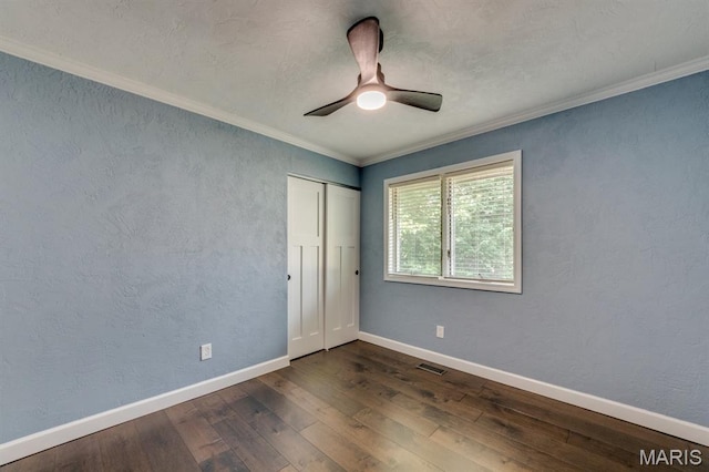 3534 Carriage Run Dr, Saint Charles, MO 63303 - spare room featuring crown molding, dark wood finished floors, and a ceiling fan