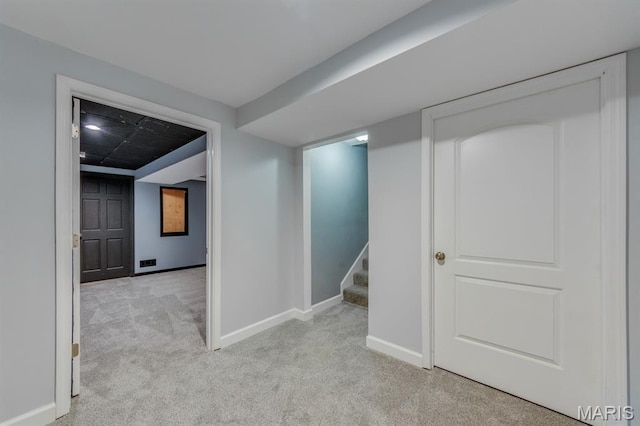 3534 Carriage Run Dr, Saint Charles, MO 63303 - finished below grade area with light colored carpet and stairway